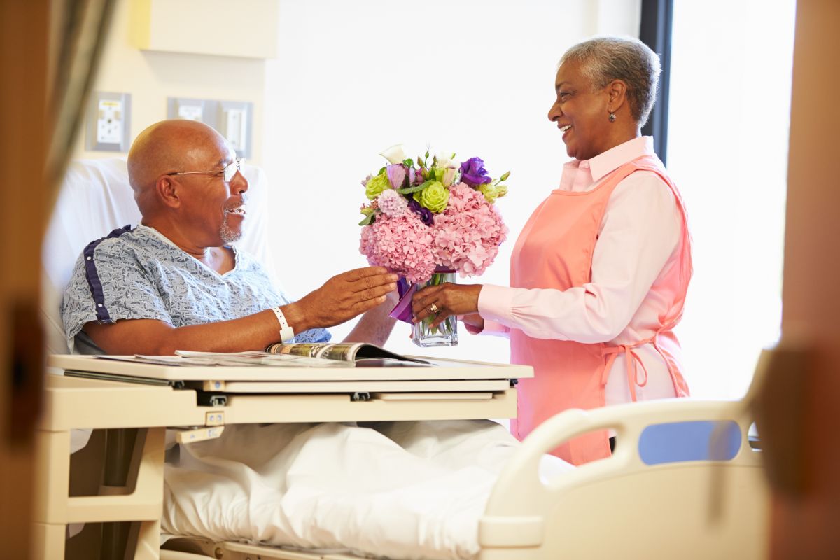 Volunteer Delivering Patient Flowers